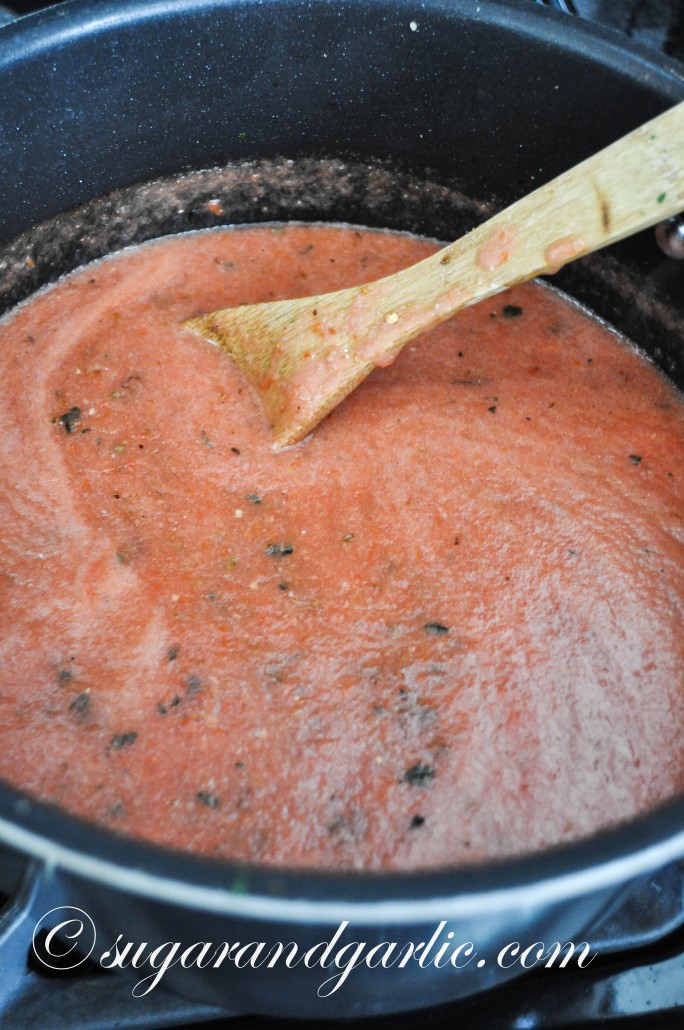 simmer pureed tomatoes